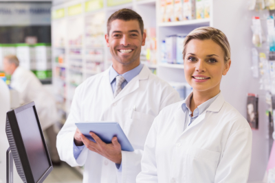 two pharmacists smiling
